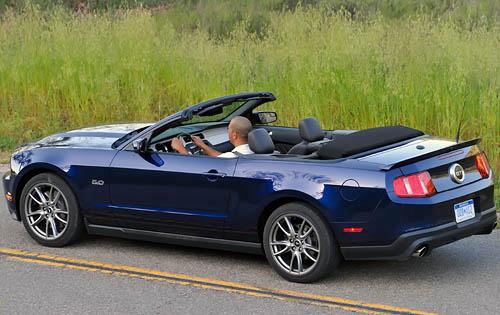 2011 mustang convertible black. nicer than the Mustang 5.0