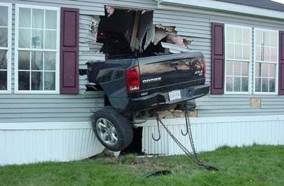 Truck Crashed Through Side Of House