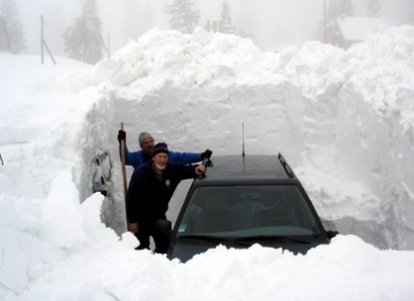 Car Surrounded By Snow