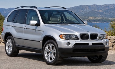 2005 BMW X5 first-generation SUV in silver, front three-quarter view