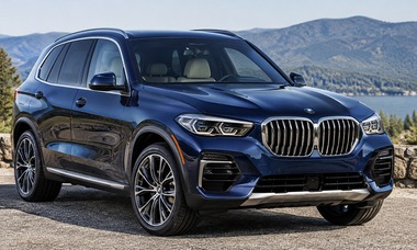 2022 BMW X5 luxury SUV in dark metallic blue, front three-quarter view